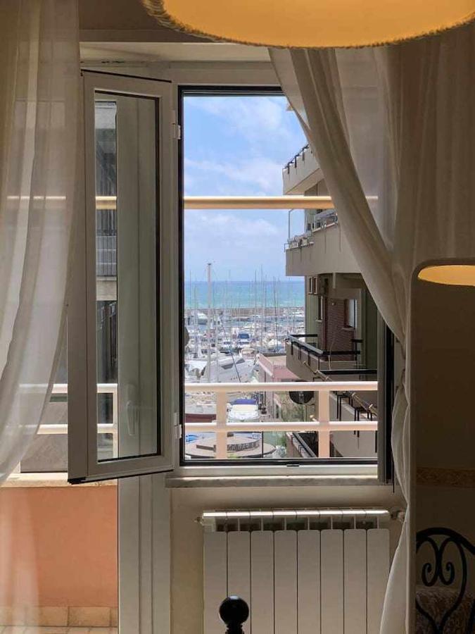 Appartamento Sul Porto Nettuno Exterior foto